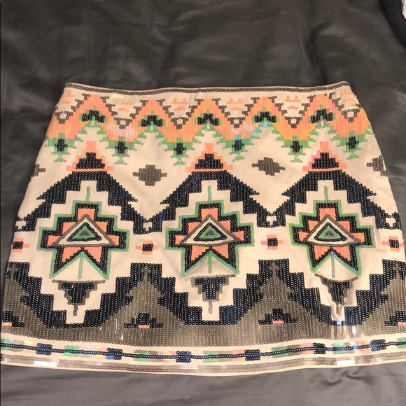 Express Dresses & Skirts - Aztec print sequin skirt from EXPRESS